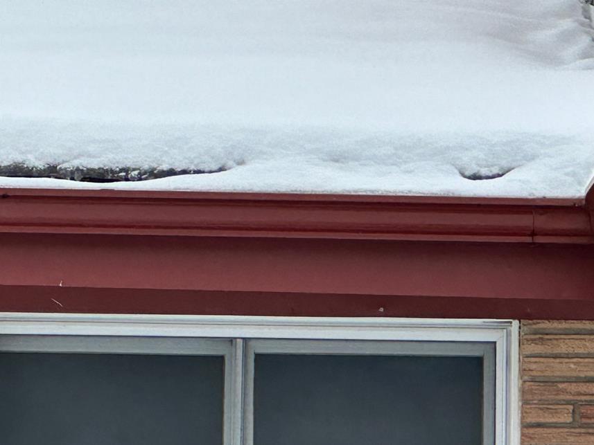 Snow melting and refreezing preventing water from draining